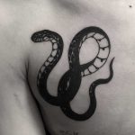 Indigo snake tattoo done at BK Ink Studio