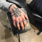 Knuckle tattoos by Kirk Budden
