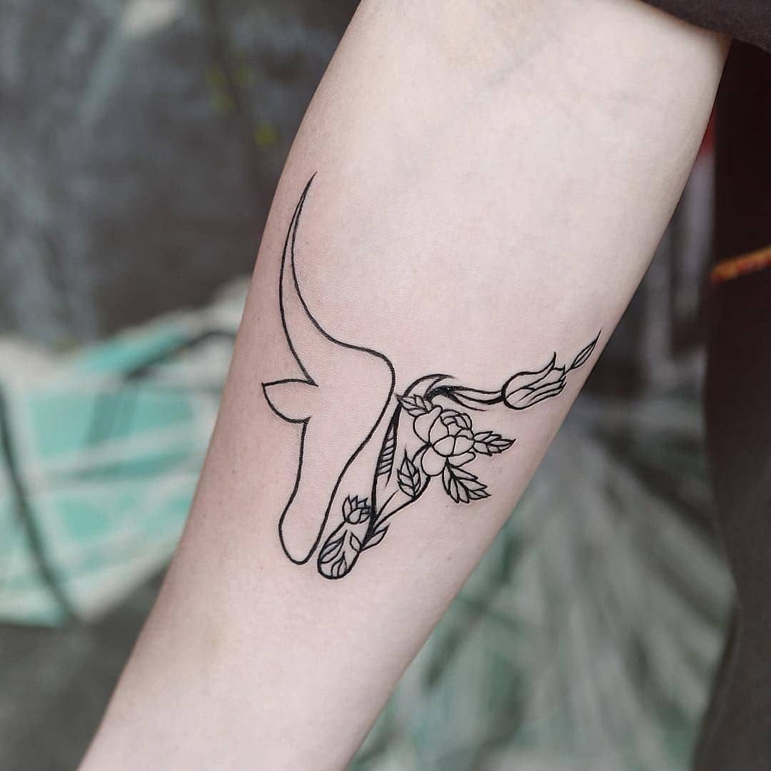 Linear and floral bull tattoo