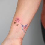 Little hummingbird and peony tattoo
