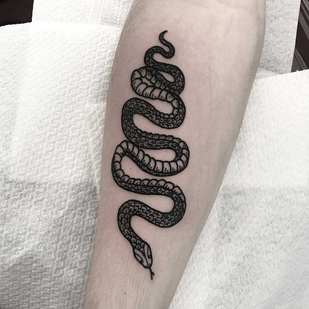 Long snake tattoo by Deborah Pow