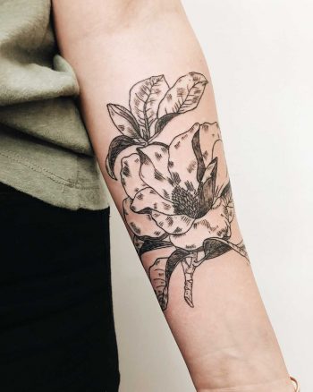 Magnolia bloom tattoo by Finley Jordan