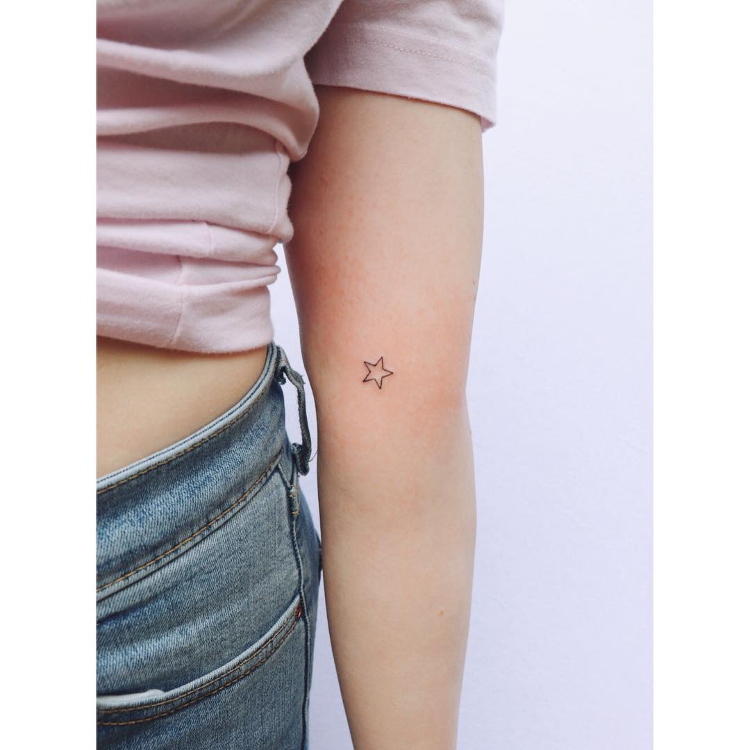 Micro star by tattooist Zaya