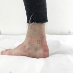 Mini rectangle tattoo by Jay Rose