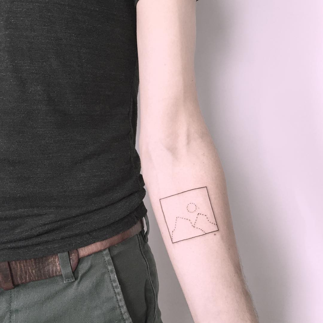 Minimal mountains tattoo by Chinatown Stropky