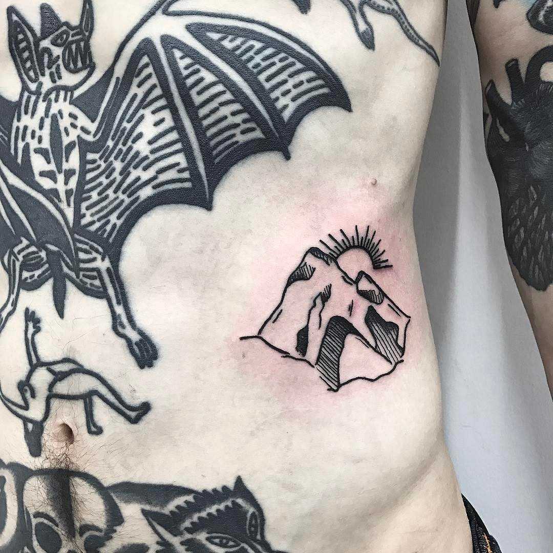 Mountains tattoo by Jay Rose