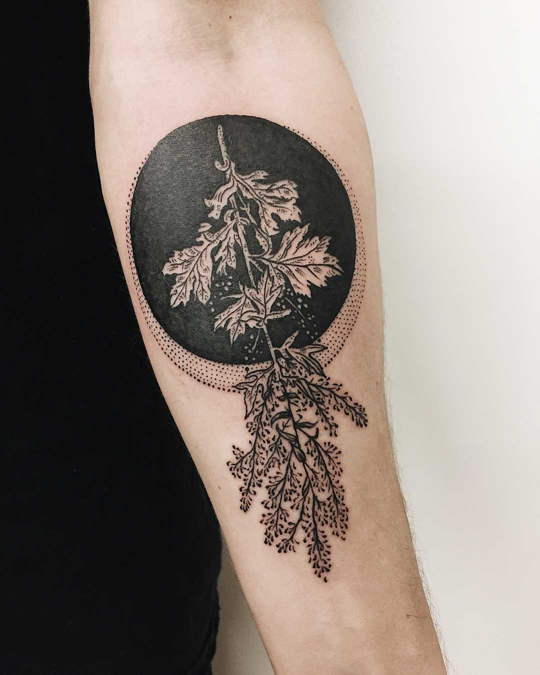Negative space plant tattoo by Finley Jordan