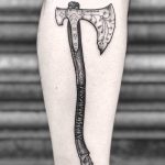 Norse ax tattoo by Lozzy Bones