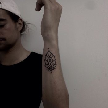 Ornamental linear flower tattoo