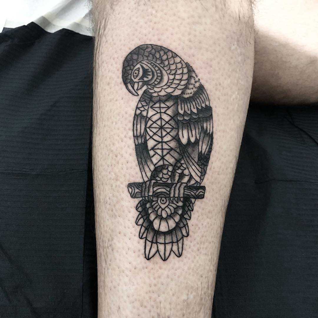 Ornamental parrot tattoo