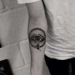 Ouroboros eye tattoo by Oliver Whiting