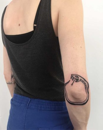 Ouroboros on the right elbow