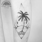 Palm tree and sunset tattoo