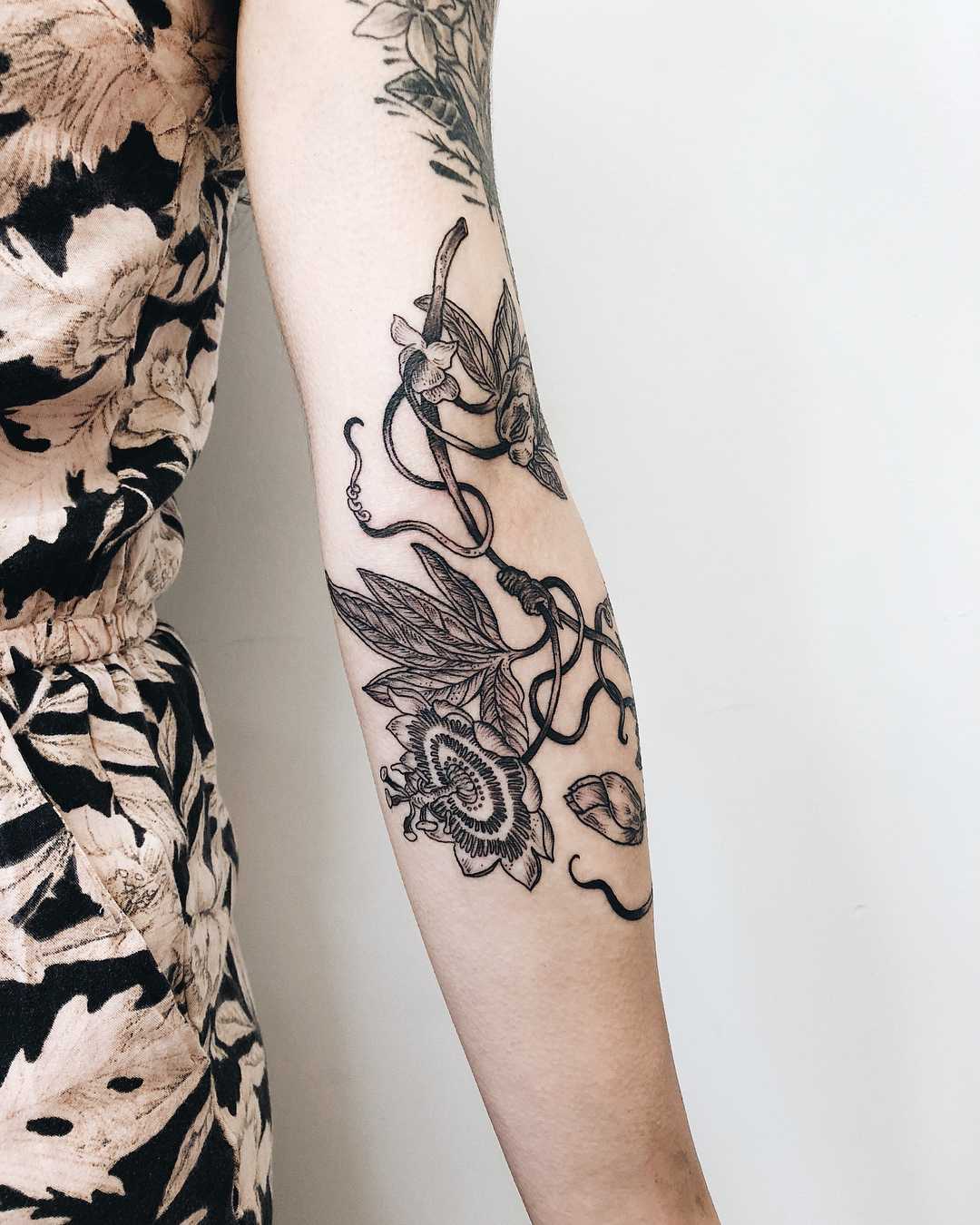 Passion flower tattoo by Finley Jordan