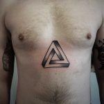 Penrose triangle tattoo on the sternum