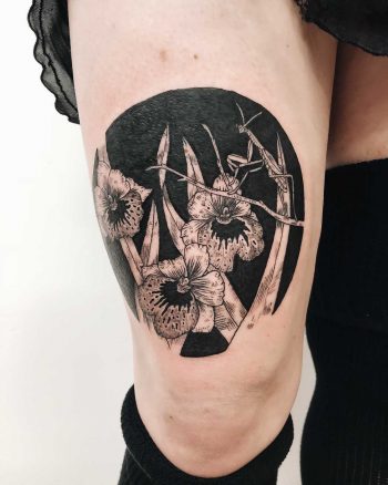 Praying mantis on the pansy orchids tattoo