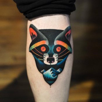 Raccoon and mountains tattoo