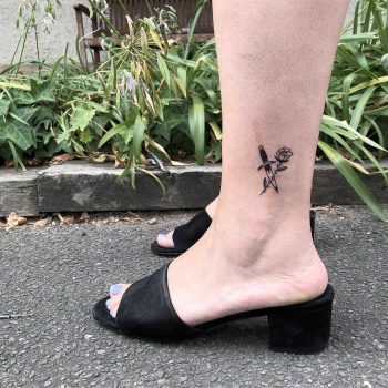 Rose and dagger by tattooist yeahdope