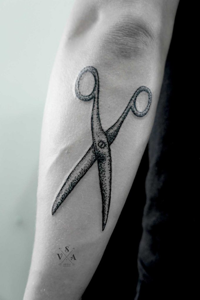 Scissors tattoo by Andrei Svetov
