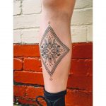 Shin shield by tattooist Zaya