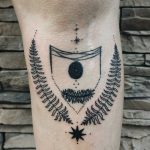 Shin shield tattoo by Finley Jordan