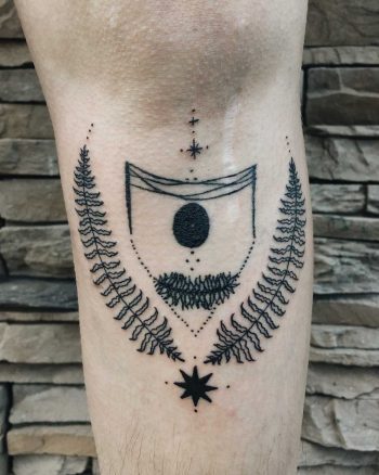 Shin shield tattoo by Finley Jordan