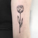 Simple black and grey rose tattoo