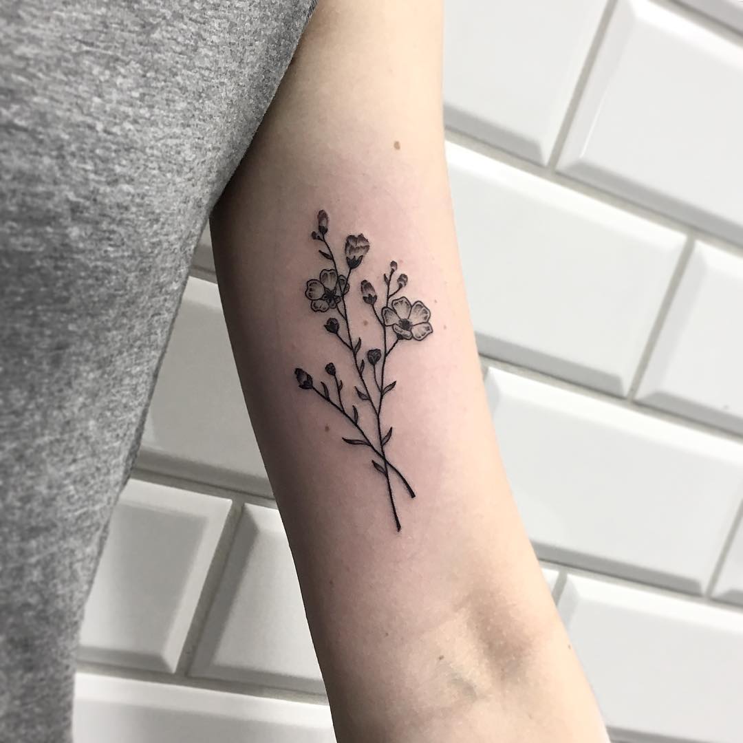 Simple wildflowers bundle tattoo