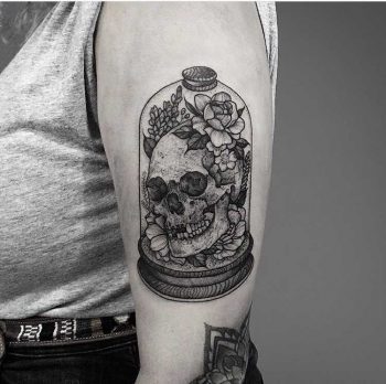 Skull in a glass dome by Thomas Bates