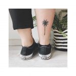 Small palm tree on the right ankle
