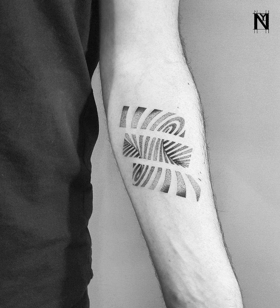 Swirl tattoo by Noam Yona