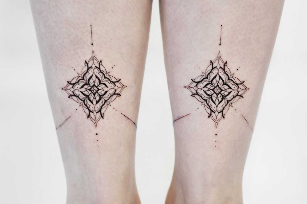 Symmetrical pattern tattoos 