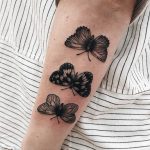 Three butterfly tattoos by Finley Jordan