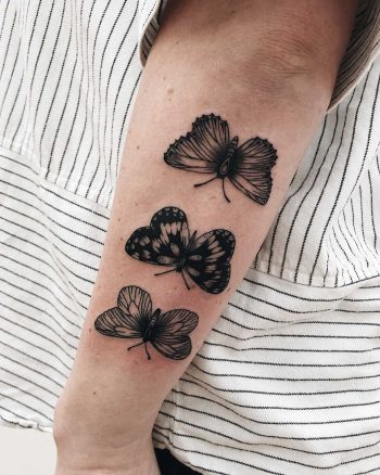 Three butterfly tattoos by Finley Jordan
