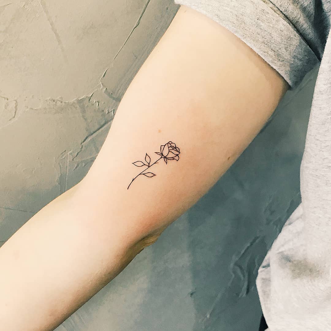 Tiny rose by artist Cholo