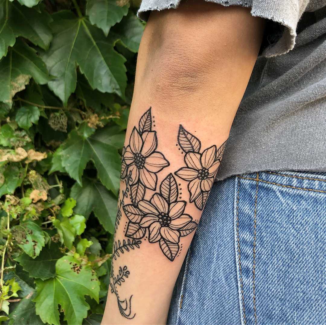 Triple floral tattoo