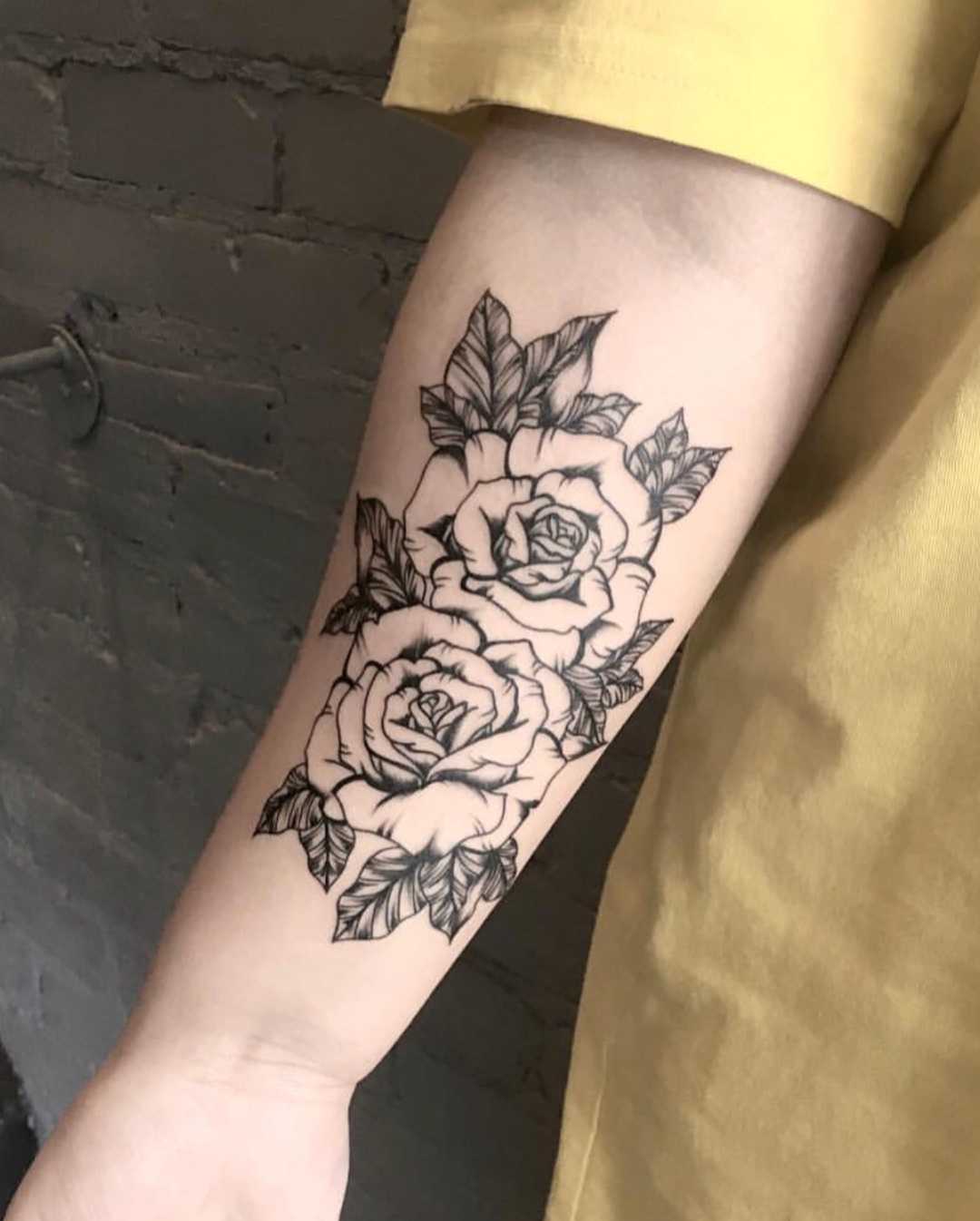 Two black roses tattoo