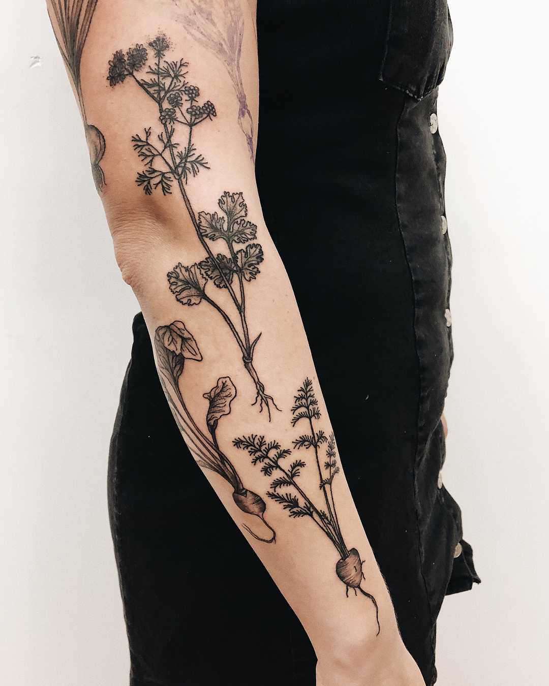 Various unearthed plant tattoos by Finley Jordan