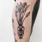 Vase with flowers tattoo by Finley Jordan