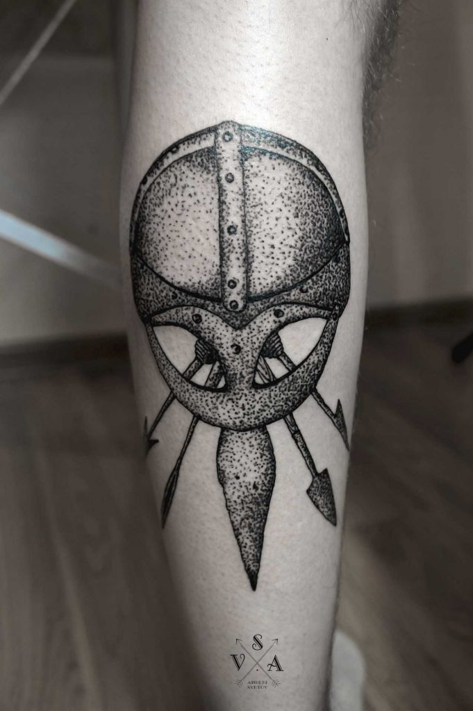 Viking helmet tattoo by Andrei Svetov