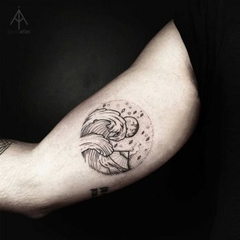 Waves, moon, and mountain tattoo