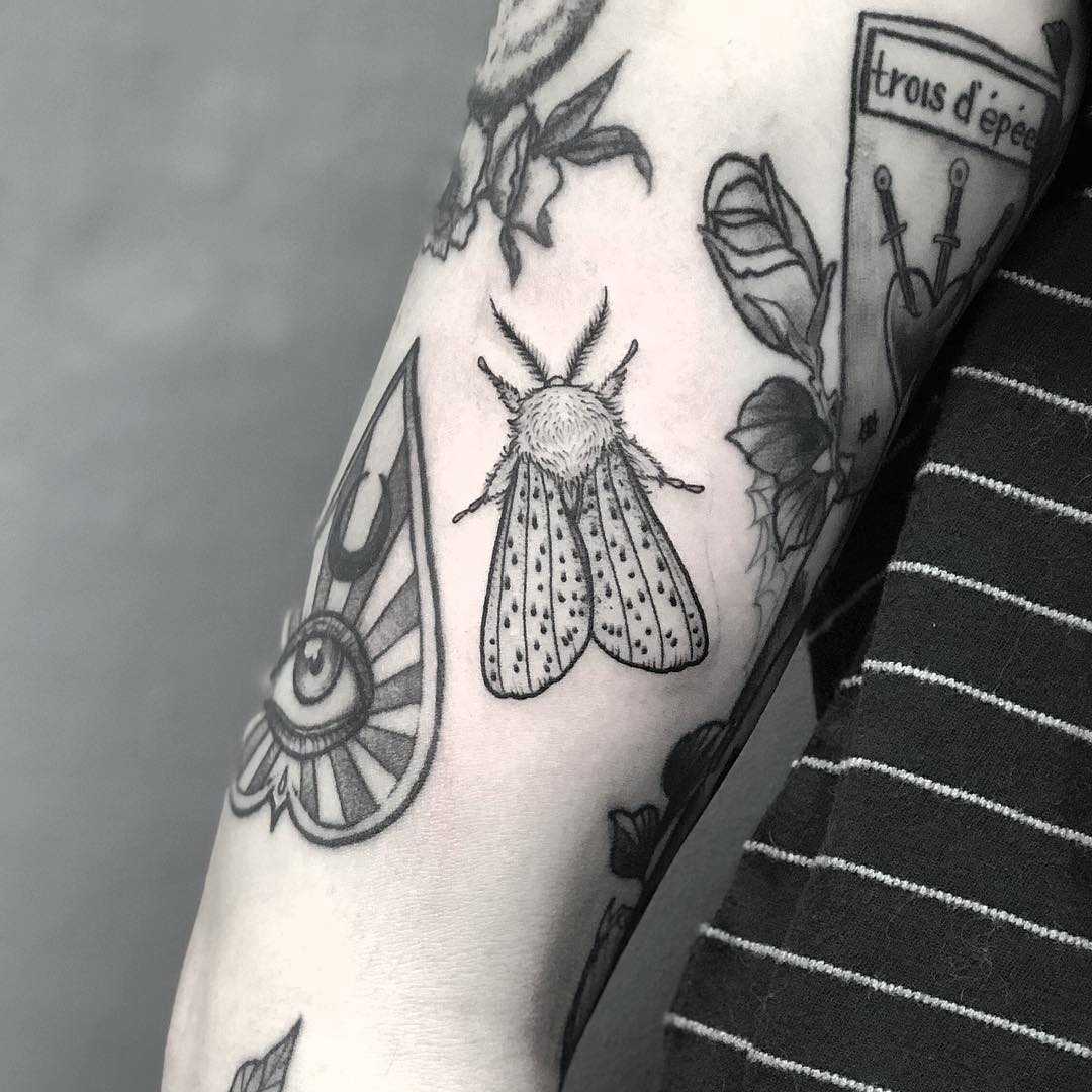 White ermine moth tatto by Lozzy Bones