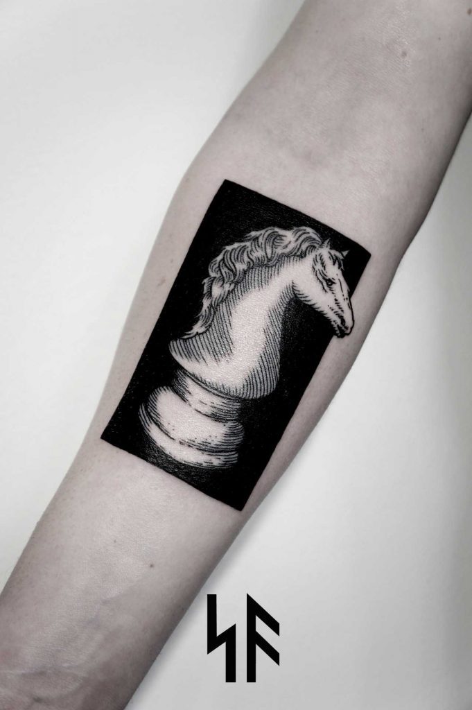 White knight chess piece tattoo