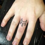 Wicken symbol tattoo by Kirk Budden