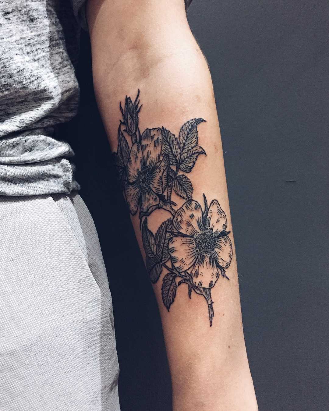 Wild roses tattoo by Finley Jordan