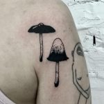 A pair of mushrooms tattoo by Kevin Jenkins