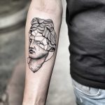 Apollo bust tattoo by Mike Nofuck