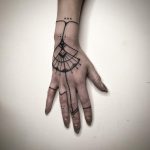 Beautiful hand tattoo by artist Meritattoon