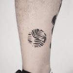Black and grey plant tattoo by anton1otattoo