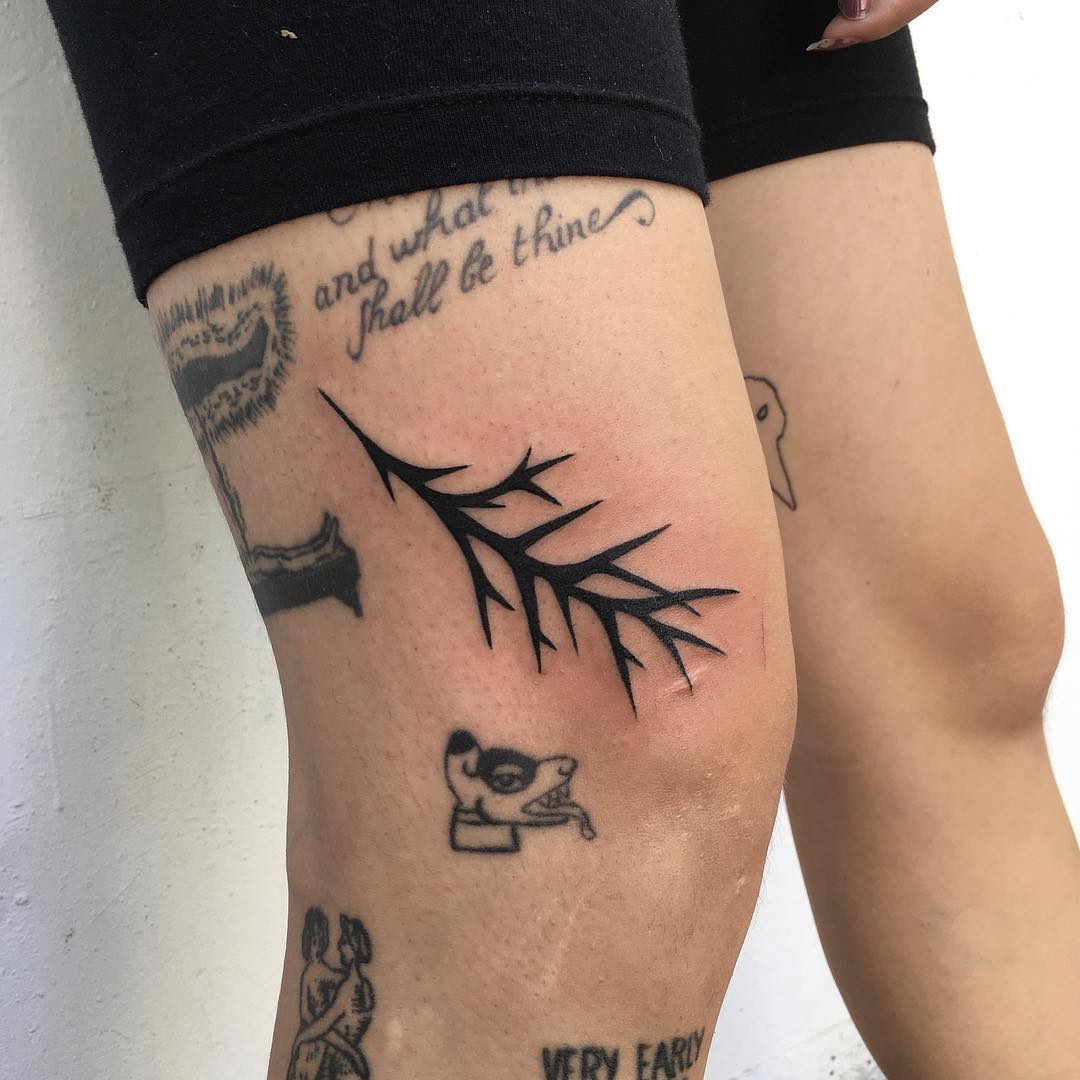 Black branch tattoo by Agata Agataris